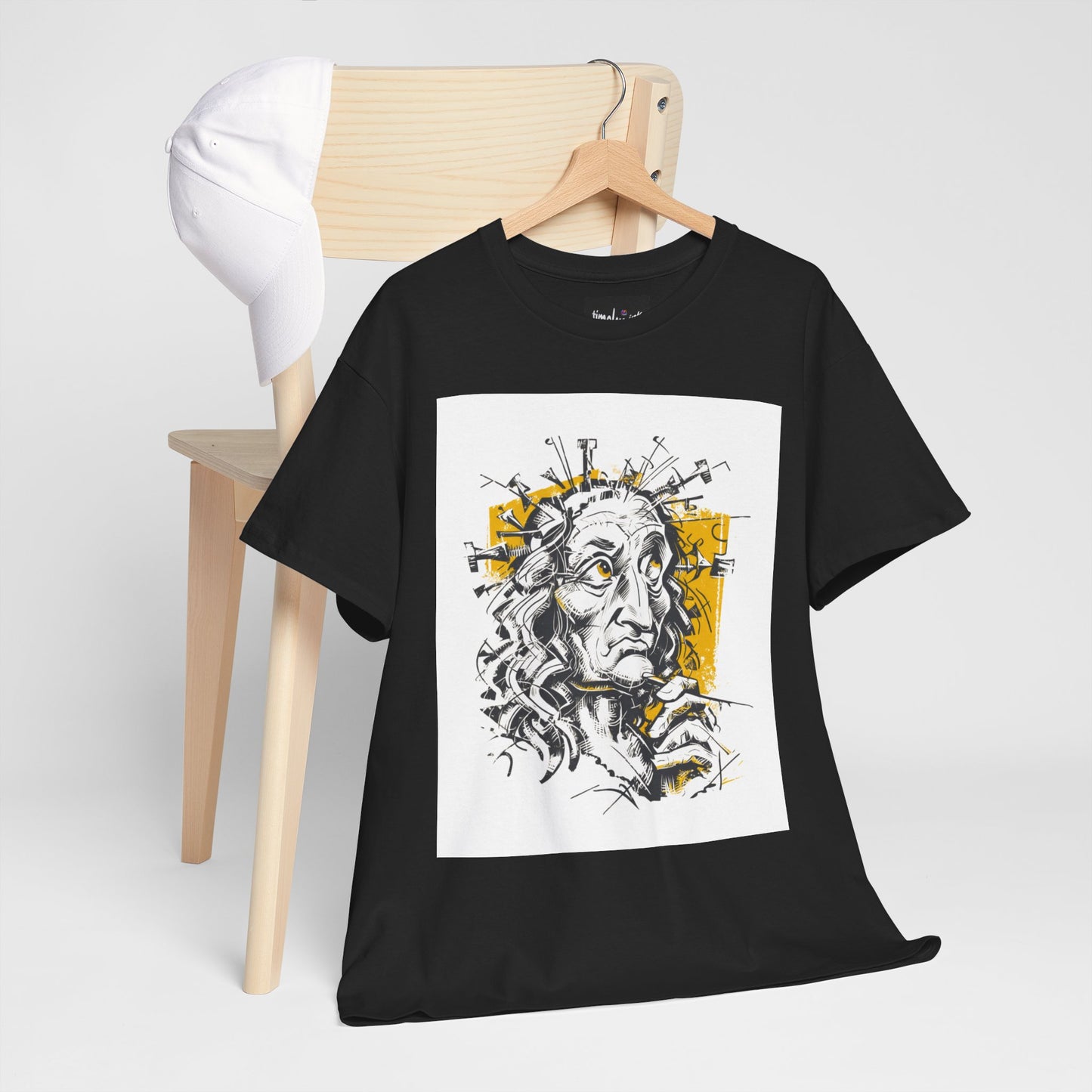 Black t-shirt with a graphic design of a face on a hanger against a white background