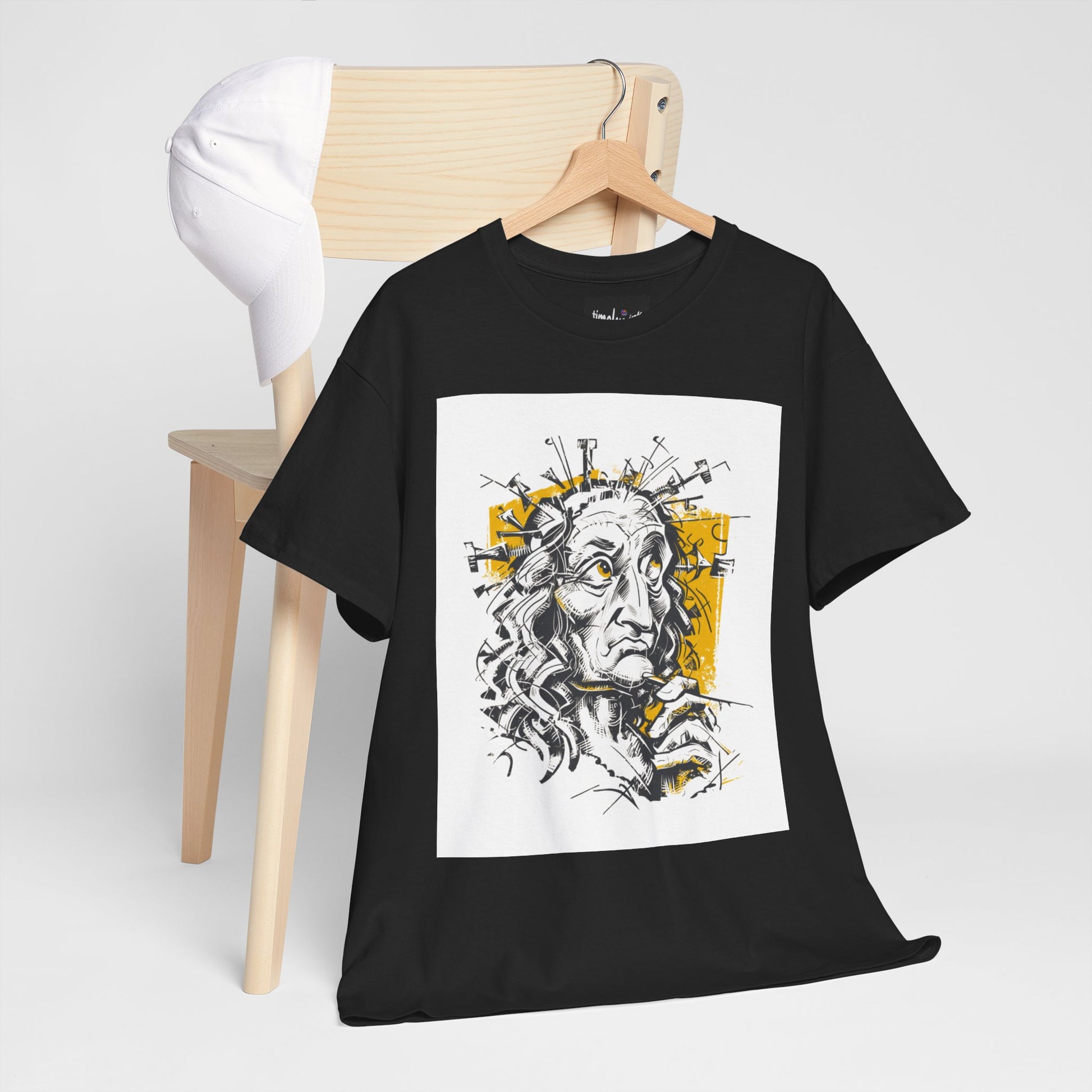 Black t-shirt with a graphic design of a face on a hanger against a white background