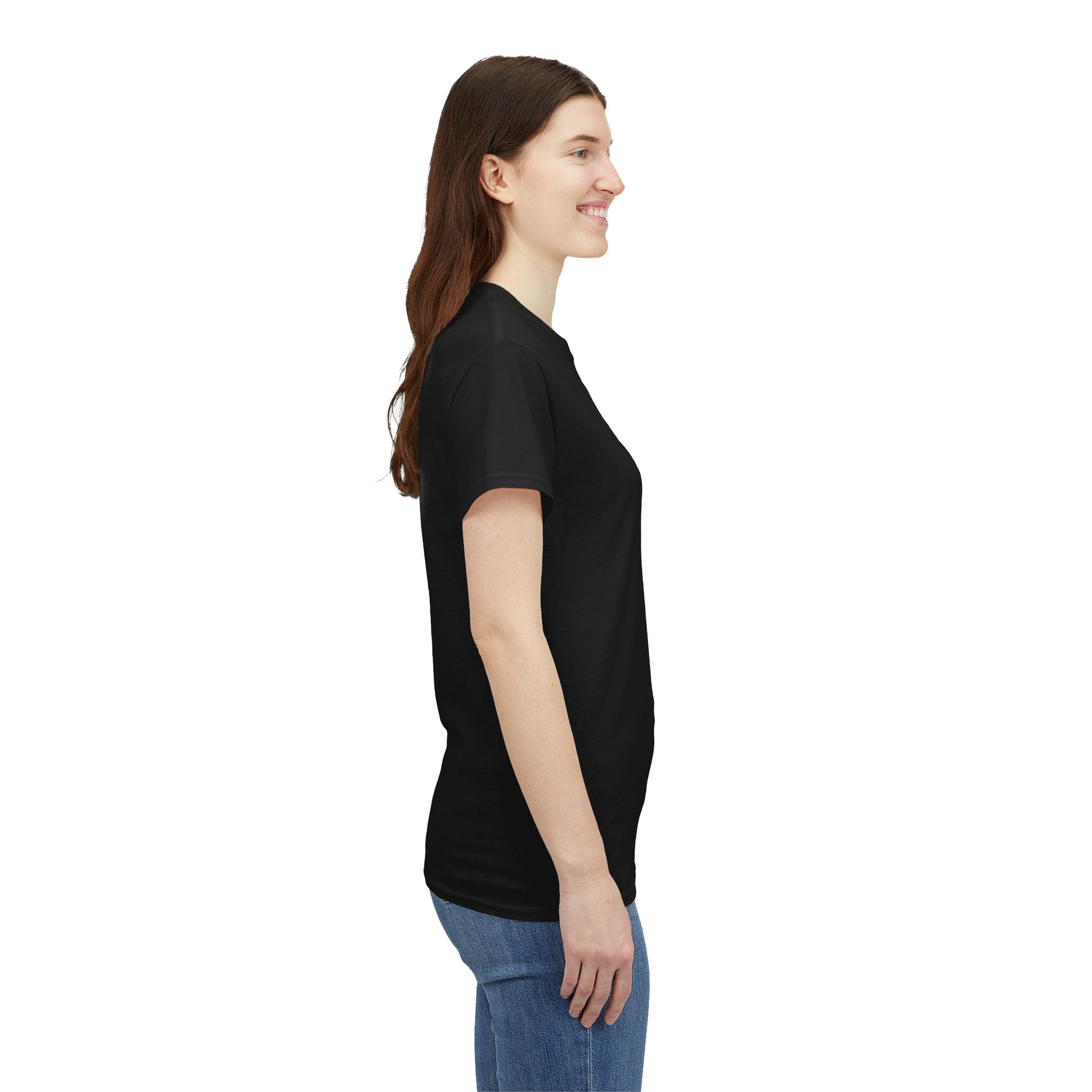 Woman wearing a black t-shirt and blue jeans on a white background