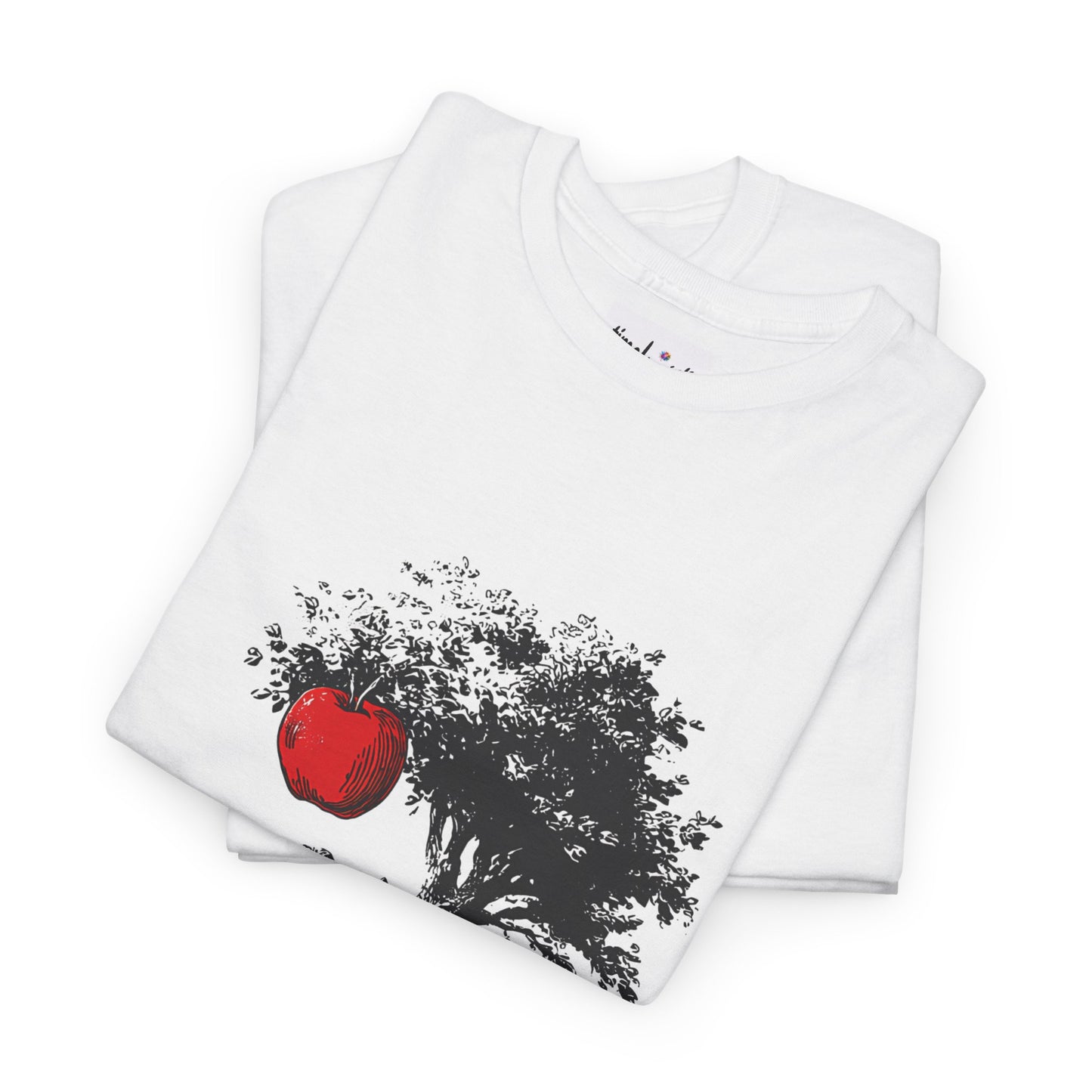 White t-shirt with a red apple and black abstract design on a white background