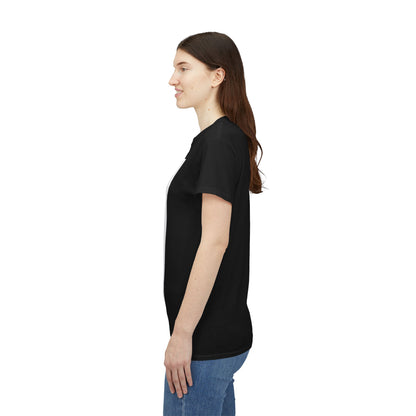 Woman wearing a black t-shirt and blue jeans on a white background